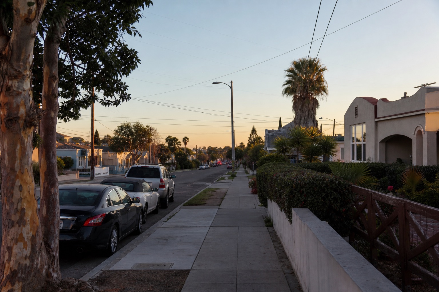 AI editorial reconstruction of a quiet Valencia Park neighborhood street in late afternoon